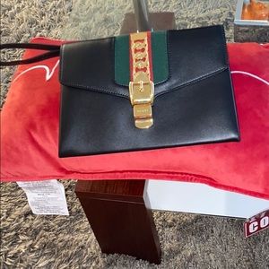 Gucci Sylvie clutch/wristlets